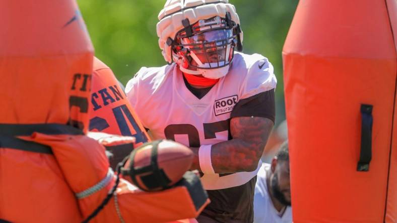 Cleveland Browns defensive end Perrion Winfrey works on pass rushing drill during training camp on Saturday, July 30, 2022 in Berea.

Akr 7 30 Browns 16