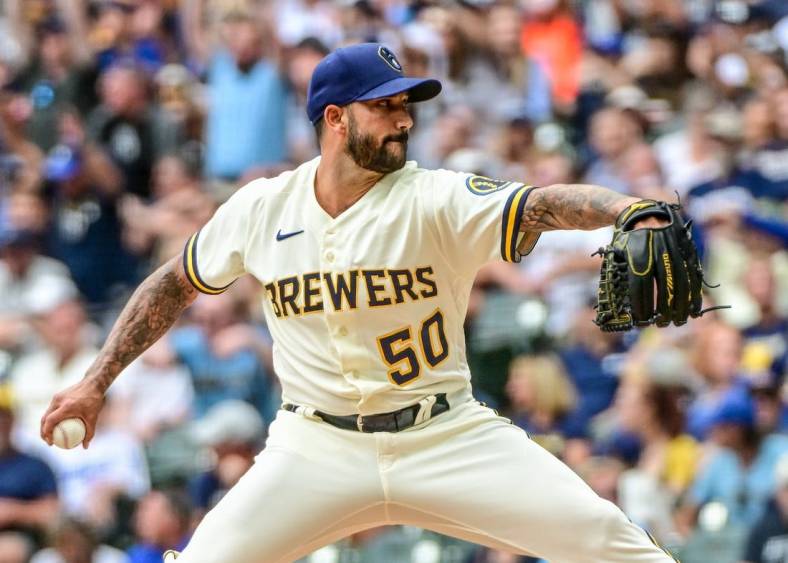 Aug 18, 2022; Milwaukee, Wisconsin, USA; Milwaukee Brewers pitcher Matt Bush (50) throws a pitch in the eighth inning against the Los Angeles Dodgers at American Family Field. Mandatory Credit: Benny Sieu-USA TODAY Sports