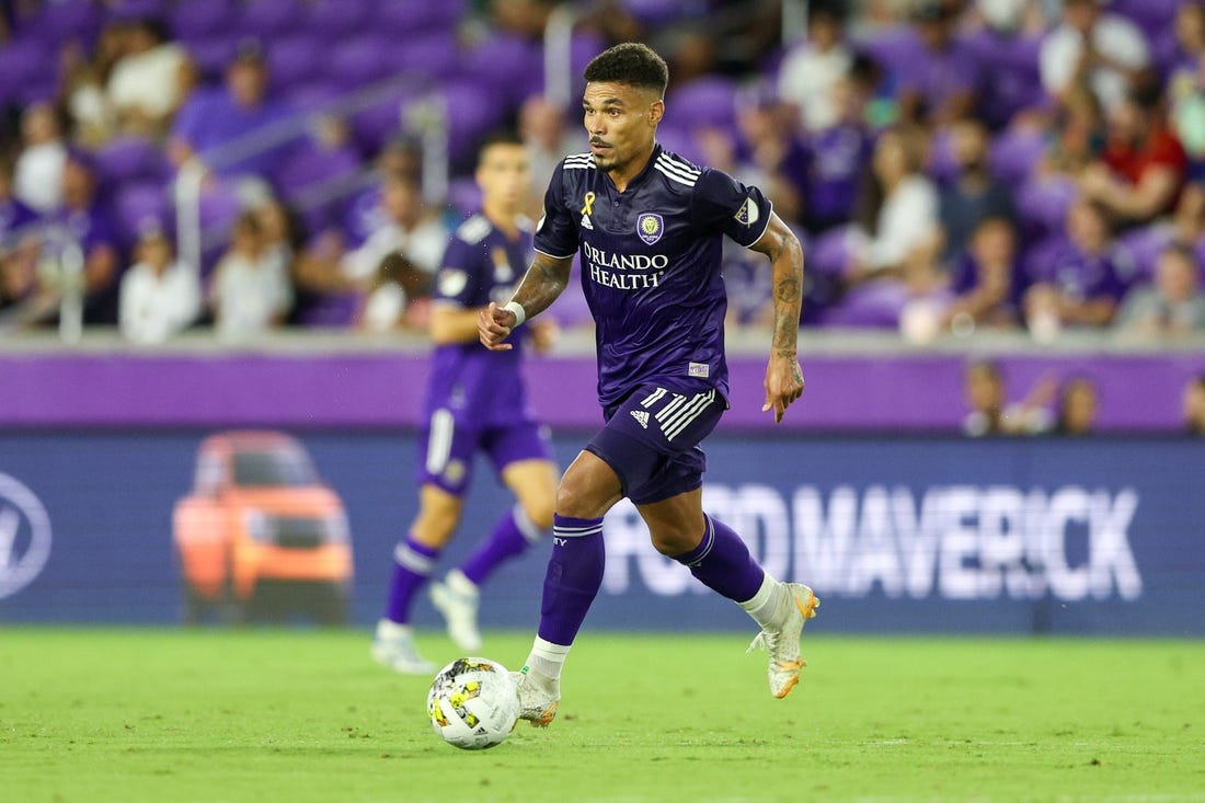 Sep 17, 2022; Orlando, Florida, USA;  Orlando City midfielder Junior Urso (11) controls the ball against Toronto FC in the second half at Exploria Stadium. Mandatory Credit: Nathan Ray Seebeck-USA TODAY Sports