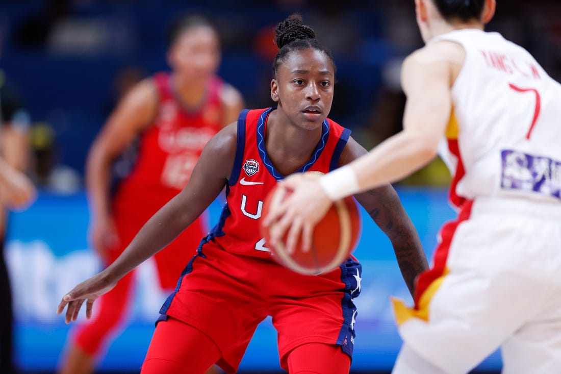 OCT 1, 2022; Sydney, AUS; Jewell Loyd (4)    and Liwei YANG (7) in second quarter of FIBA Women   s World Cup final against China at Sydney SuperDome. Mandatory Credit: Yukihito Taguchi-USA TODAY Sports