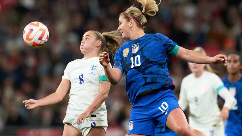 Oct 7, 2022; London, ENG; England midfielder Georgia Stanway (8) under pressure from United states midfielder Lindsey Horan (10) in the match between United States and England at Wembley Stadium. Mandatory Credit: Peter van den Berg-USA TODAY Sports