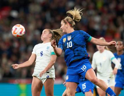 Oct 7, 2022; London, ENG; England midfielder Georgia Stanway (8) under pressure from United states midfielder Lindsey Horan (10) in the match between United States and England at Wembley Stadium. Mandatory Credit: Peter van den Berg-USA TODAY Sports