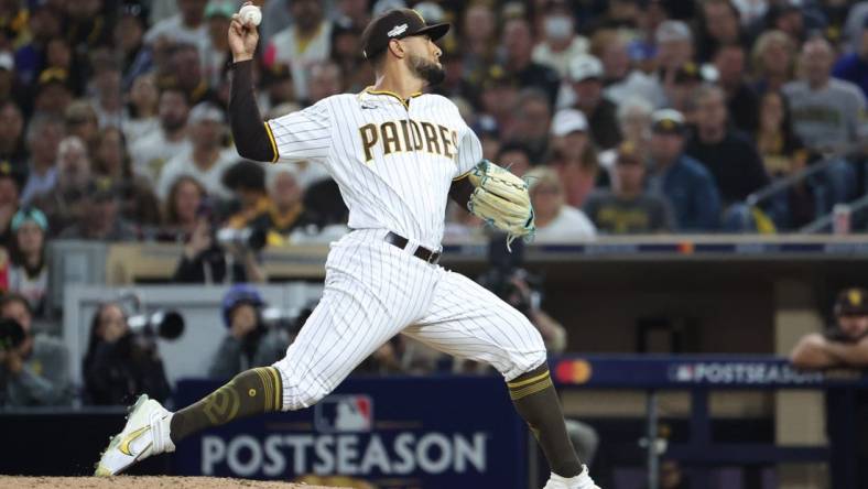 Oct 14, 2022; San Diego, California, USA; San Diego Padres relief pitcher Robert Suarez (75) throws a pitch in the eighth inning against the Los Angeles Dodgers during game three of the NLDS for the 2022 MLB Playoffs at Petco Park. Mandatory Credit: Kiyoshi Mio-USA TODAY Sports