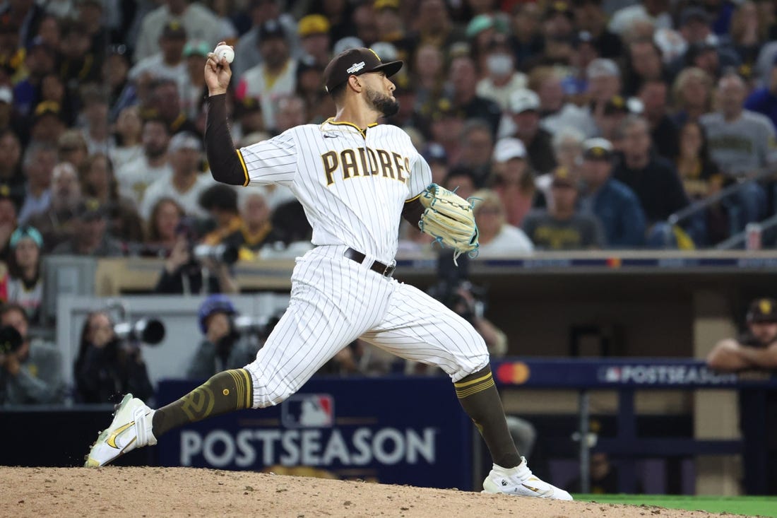 Oct 14, 2022; San Diego, California, USA; San Diego Padres relief pitcher Robert Suarez (75) throws a pitch in the eighth inning against the Los Angeles Dodgers during game three of the NLDS for the 2022 MLB Playoffs at Petco Park. Mandatory Credit: Kiyoshi Mio-USA TODAY Sports