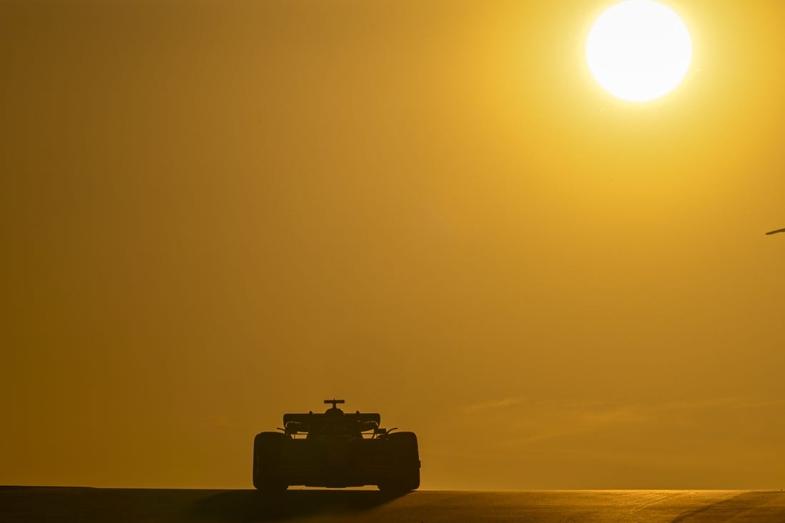 Oct 21, 2022; Austin, Texas, USA; A general view of an F1 driver during sunset in practice for the U.S. Grand Prix at the Circuit of the Americas. Mandatory Credit: Jerome Miron-USA TODAY Sports