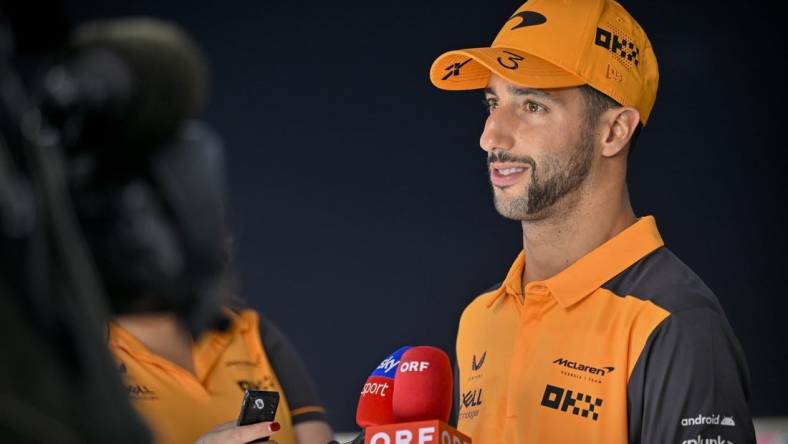 Oct 22, 2022; Austin, Texas, USA; McLaren F1 Team driver Daniel Ricciardo (3) of Team Australia is interviewed after the qualifying session for the U.S. Grand Prix at Circuit of the Americas. Mandatory Credit: Jerome Miron-USA TODAY Sports