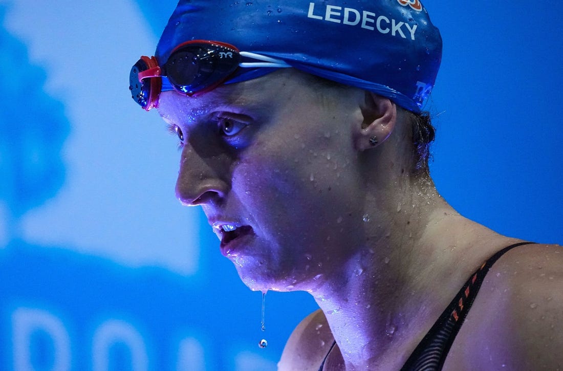 Nov 4, 2022; Indianapolis, IN, USA; United States Katie Ledecky walks off the pool deck after competing in the 200 meter freestyle swim during the FINA Swimming World Cup finals on Friday, Nov 4, 2022; Indianapolis, IN, USA;  at Indiana University Natatorium. Mandatory Credit: Grace Hollars-USA TODAY Sports