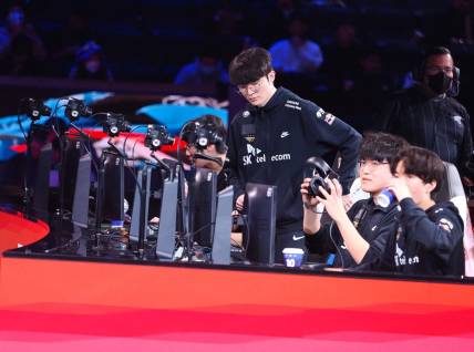Nov 5, 2022; San Francisco, California, USA; T1 mid laner Lee "Faker" Sang-hyeok sits down to play game 4 against DRX during the League of Legends World Championships at Chase Center. Mandatory Credit: Kelley L Cox-USA TODAY Sports