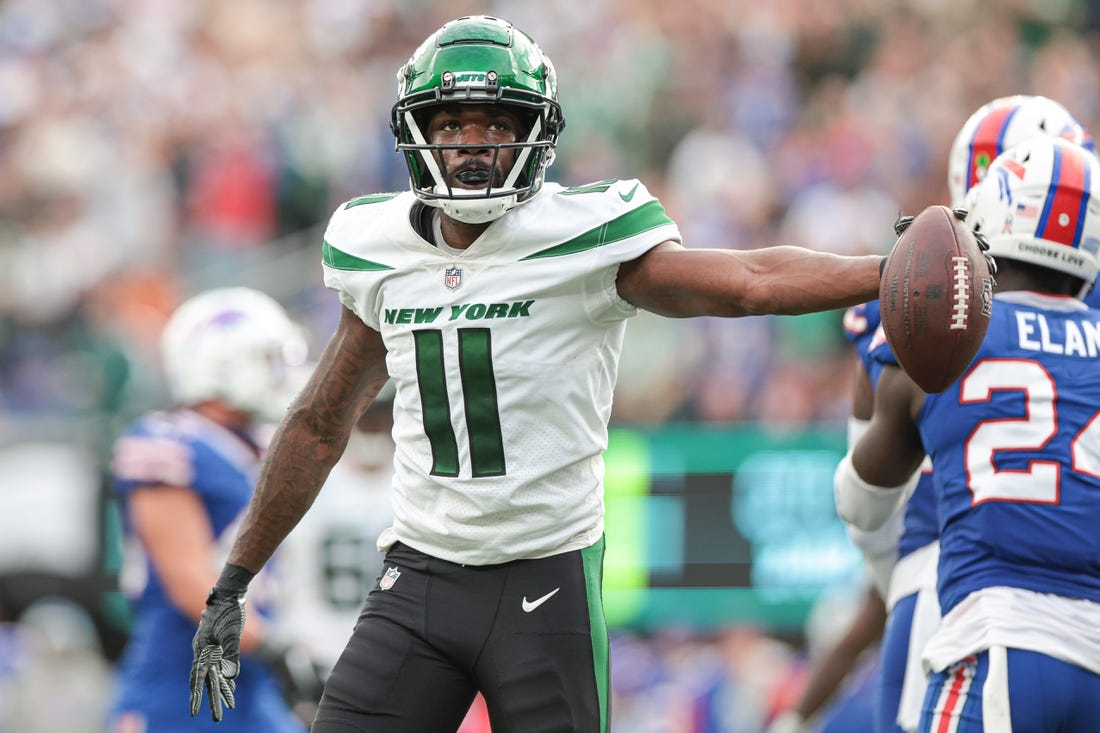 Nov 6, 2022; East Rutherford, New Jersey, USA; New York Jets wide receiver Denzel Mims (11) reacts after making a catch during the fourth quarter against the Buffalo Bills at MetLife Stadium. Mandatory Credit: Vincent Carchietta-USA TODAY Sports