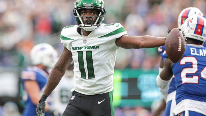 Nov 6, 2022; East Rutherford, New Jersey, USA; New York Jets wide receiver Denzel Mims (11) reacts after making a catch during the fourth quarter against the Buffalo Bills at MetLife Stadium. Mandatory Credit: Vincent Carchietta-USA TODAY Sports