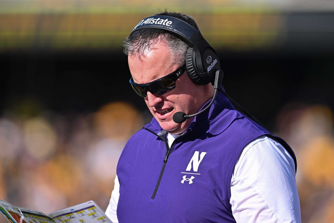 Oct 29, 2022; Iowa City, Iowa, USA; Northwestern Wildcats head coach Pat Fitzgerald looks on during the game against the Iowa Hawkeyes at Kinnick Stadium. Mandatory Credit: Jeffrey Becker-USA TODAY Sports