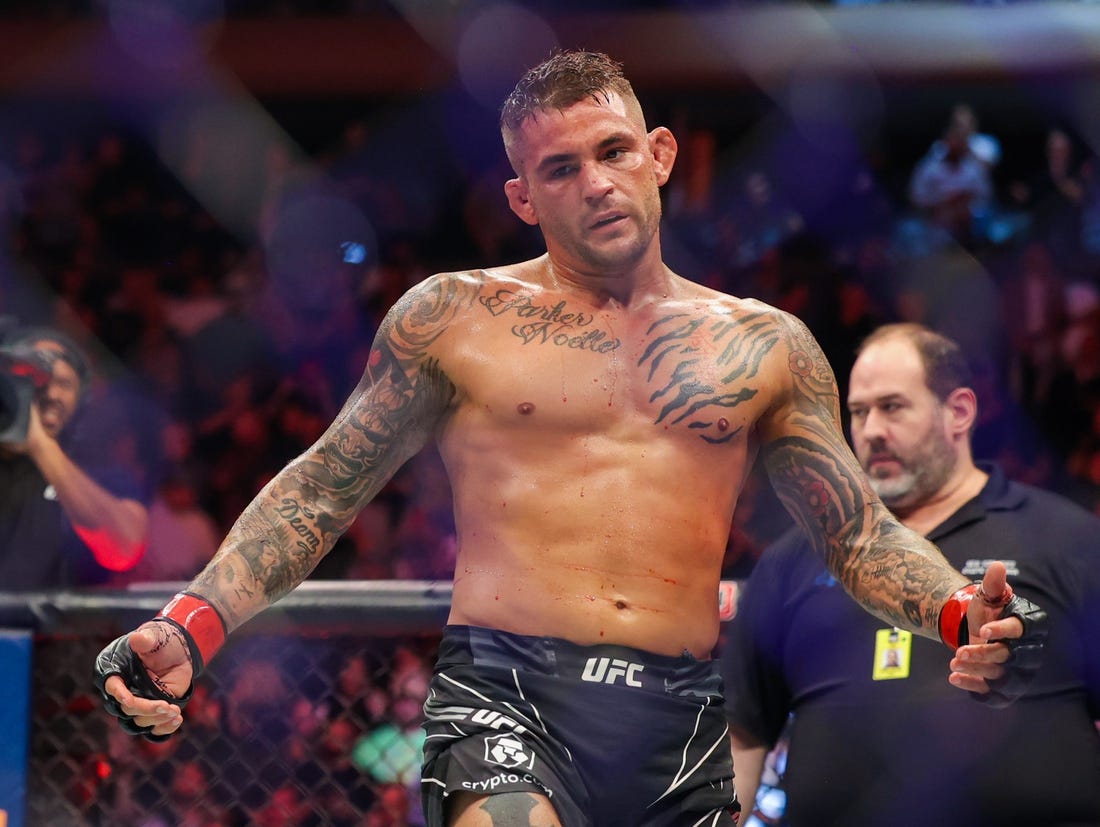 Nov 12, 2022; New York, NY, USA; Dustin Poirier (red gloves) defeats Michael Chandler (blue gloves) during UFC 281 at Madison Square Garden. Mandatory Credit: Jessica Alcheh-USA TODAY Sports
