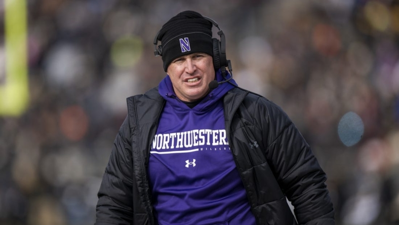 Nov 19, 2022; West Lafayette, Indiana, USA;  Northwestern Wildcats head coach Pat Fitzgerald walks the sidelines during the second quarter against the Purdue Boilermakers at Ross-Ade Stadium. Mandatory Credit: Marc Lebryk-USA TODAY Sports