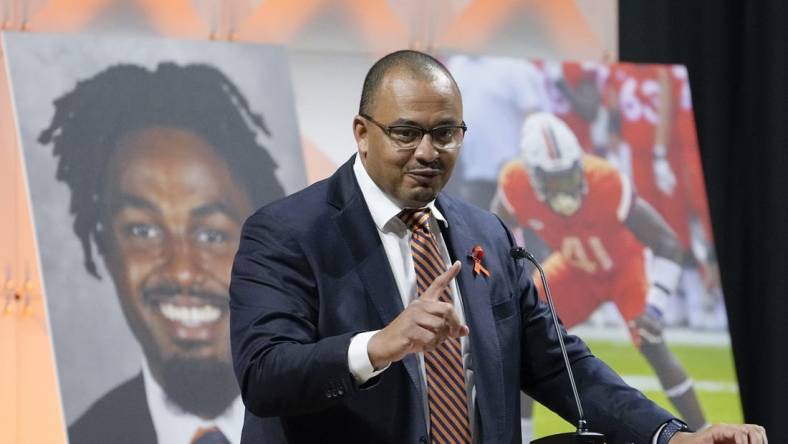 Nov 19, 2022; Charlottesville, Virginia, US; University of Virginia football coach Tony Elliott speaks during a memorial service for three slain University of Virginia football players Lavel Davis Jr., D Sean Perry and Devin Chandler at John Paul Jones Arena at the school in Charlottesville, Va., Saturday, Nov. 19, 2022. Mandatory Credit: Steve Helber/Pool Photo-USA TODAY Sports