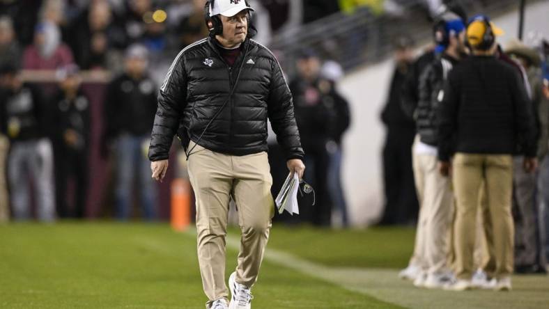 Nov 26, 2022; College Station, Texas, USA; Texas A&M Aggies head coach Jimbo Fisher walks the sidelines during the second quarter against the LSU Tigers at Kyle Field. Mandatory Credit: Jerome Miron-USA TODAY Sports