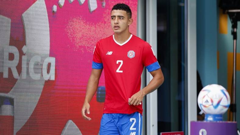 Nov 27, 2022; Al Rayyan, Qatar; Costa Rica midfielder Daniel Chacon (2) walks out to the pitch before a group stage match against Japan during the 2022 World Cup at Ahmad Bin Ali Stadium. Mandatory Credit: Yukihito Taguchi-USA TODAY Sports