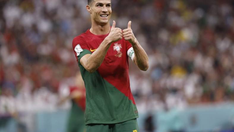 Nov 28, 2022; Lusail, Qatar; Portugal forward Cristiano Ronaldo (7) reacts during the second half of the group stage match in the 2022 World Cup at Lusail Stadium. Mandatory Credit: Yukihito Taguchi-USA TODAY Sports