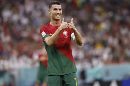 Nov 28, 2022; Lusail, Qatar; Portugal forward Cristiano Ronaldo (7) reacts during the second half of the group stage match in the 2022 World Cup at Lusail Stadium. Mandatory Credit: Yukihito Taguchi-USA TODAY Sports