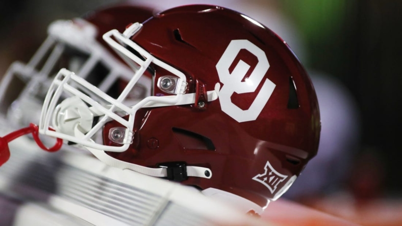 Nov 26, 2022; Lubbock, Texas, USA;  A general view oaf an Oklahoma Sooners helmet on the bench during the game between against the Texas Tech Red Raiders at Jones AT&T Stadium and Cody Campbell Field. Mandatory Credit: Michael C. Johnson-USA TODAY Sports
