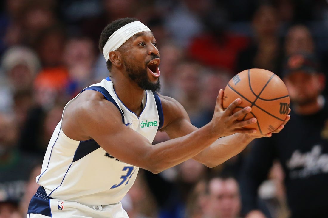 Dec 17, 2022; Cleveland, Ohio, USA; Dallas Mavericks guard Kemba Walker (34) reacts after a foul call during the second half against the Cleveland Cavaliers at Rocket Mortgage FieldHouse. Mandatory Credit: Aaron Josefczyk-USA TODAY Sports