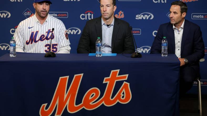 Dec 20, 2022; NY, NY, USA; New York Mets pitcher Justin Verlander (left to right) speaks to the media with Mets general manager Billy Eppler and his agent Mark Pieper during a press conference at Citi Field. Mandatory Credit: Brad Penner-USA TODAY Sports