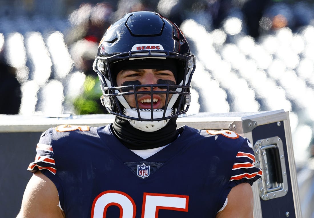 Dec 24, 2022; Chicago, Illinois, USA; Chicago Bears tight end Cole Kmet (85) stands by the heaters along the sideline before the game against the Buffalo Bills at Soldier Field. Mandatory Credit: Mike Dinovo-USA TODAY Sports