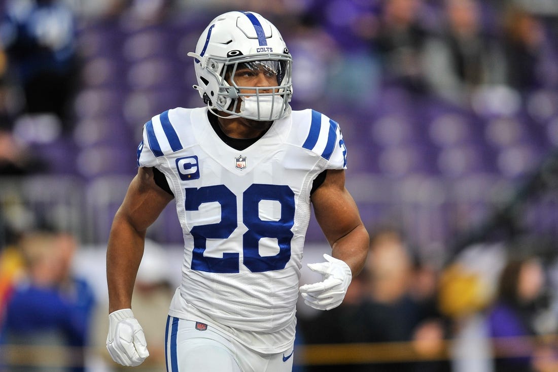 Dec 17, 2022; Minneapolis, Minnesota, USA; Indianapolis Colts running back Jonathan Taylor (28) warms up before the game against the Minnesota Vikings at U.S. Bank Stadium. Mandatory Credit: Jeffrey Becker-USA TODAY Sports