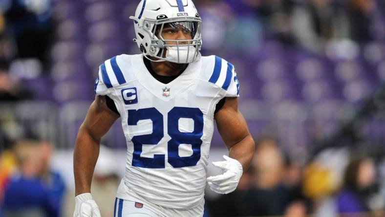 Dec 17, 2022; Minneapolis, Minnesota, USA; Indianapolis Colts running back Jonathan Taylor (28) warms up before the game against the Minnesota Vikings at U.S. Bank Stadium. Mandatory Credit: Jeffrey Becker-USA TODAY Sports