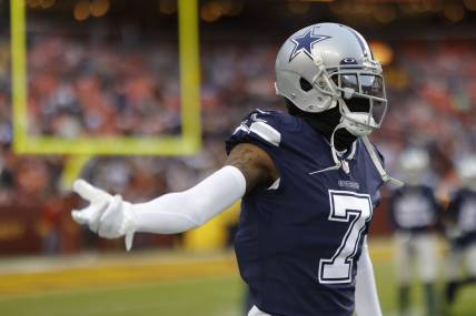 Jan 8, 2023; Landover, Maryland, USA; Dallas Cowboys cornerback Trevon Diggs (7) gestures on the field during warmups prior to the Cowboys' game against the Washington Commanders at FedExField. Mandatory Credit: Geoff Burke-USA TODAY Sports