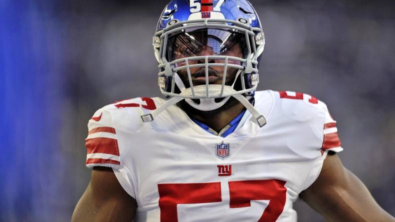 Jan 15, 2023; Minneapolis, Minnesota, USA; New York Giants linebacker Jarrad Davis (57) looks on during warmups before a wild card game against the Minnesota Vikings at U.S. Bank Stadium. Mandatory Credit: Jeffrey Becker-USA TODAY Sports