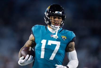 Jan 14, 2023; Jacksonville, Florida, USA; Jacksonville Jaguars tight end Evan Engram (17) against the Los Angeles Chargers during a wild card playoff game at TIAA Bank Field. Mandatory Credit: Mark J. Rebilas-USA TODAY Sports