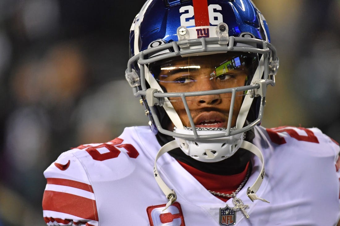 Jan 21, 2023; Philadelphia, Pennsylvania, USA; New York Giants running back Saquon Barkley (26) against the Philadelphia Eagles during an NFC divisional round game at Lincoln Financial Field. Mandatory Credit: Eric Hartline-USA TODAY Sports