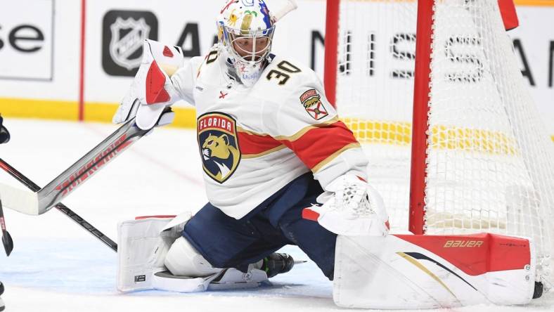 Feb 18, 2023; Nashville, Tennessee, USA; Florida Panthers goaltender Spencer Knight (30) makes a save during the third period against the Nashville Predators at Bridgestone Arena. Mandatory Credit: Christopher Hanewinckel-USA TODAY Sports