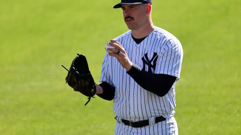 Feb 22, 2023; Tampa, FL, USA; New York Yankees starting pitcher Carlos Rodon (55) during photo day at George M. Steinbrenner Field  Mandatory Credit: Kim Klement-USA TODAY Sports