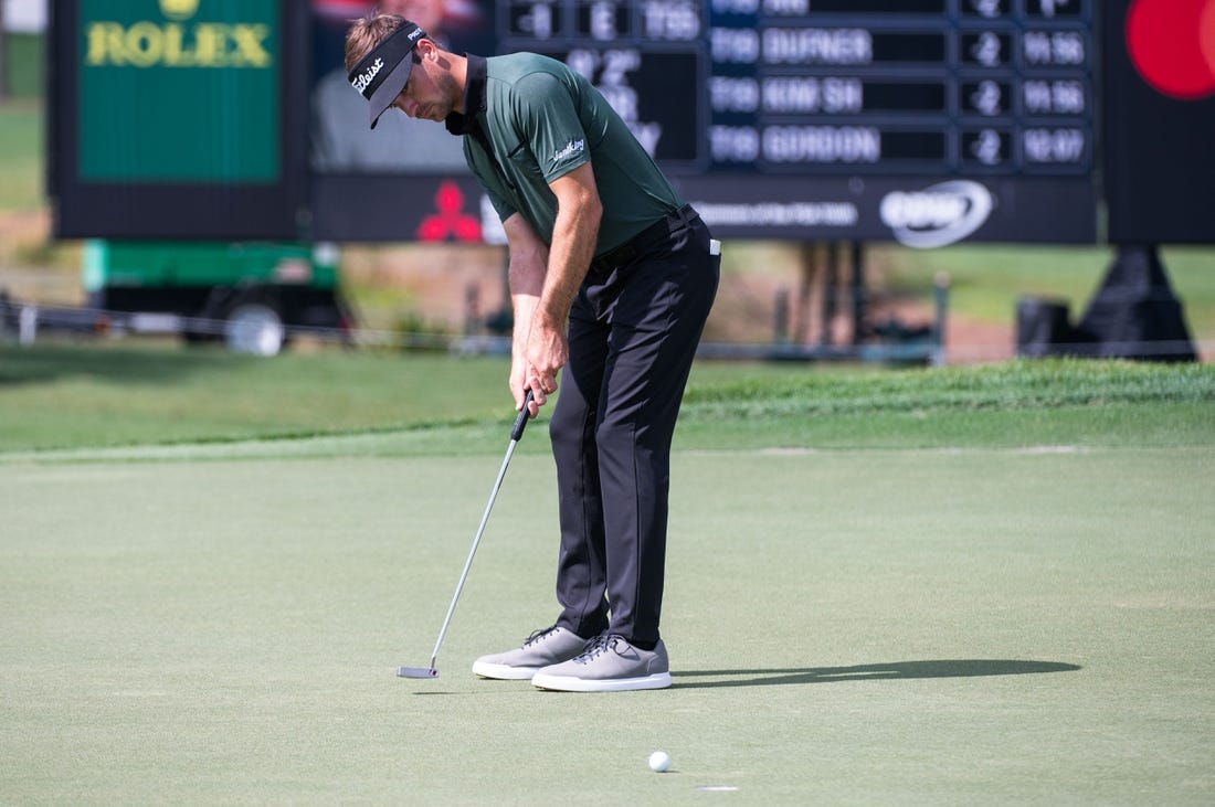 Trevor Cone putts on the ninth green during the second round of the Honda Classic at PGA National Resort & Spa on Friday, February 24, 2023, in Palm Beach Gardens, FL.