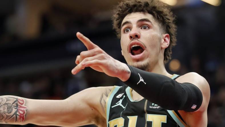 Feb 24, 2023; Minneapolis, Minnesota, USA; Charlotte Hornets guard LaMelo Ball (1) questions a referee's call for the Minnesota Timberwolves in the fourth quarter at Target Center. Mandatory Credit: Bruce Kluckhohn-USA TODAY Sports