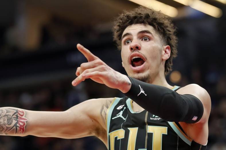 Feb 24, 2023; Minneapolis, Minnesota, USA; Charlotte Hornets guard LaMelo Ball (1) questions a referee's call for the Minnesota Timberwolves in the fourth quarter at Target Center. Mandatory Credit: Bruce Kluckhohn-USA TODAY Sports