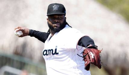 Feb 26, 2023; Jupiter, Florida, USA;  Miami Marlins starting pitcher Johnny Cueto (47) throws out St. Louis Cardinals Jose Fermin (35) in the second inning at Roger Dean Stadium. Mandatory Credit: Rhona Wise-USA TODAY Sports