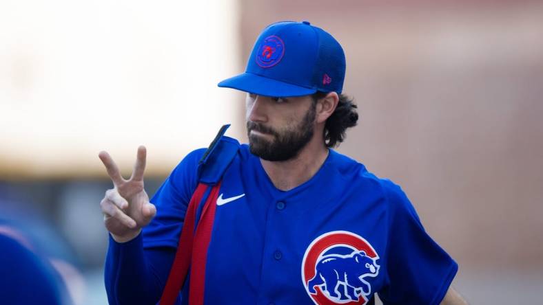 Mar 3, 2023; Peoria, Arizona, USA; Chicago Cubs infielder Dansby Swanson reacts against the San Diego Padres during a spring training game at Peoria Sports Complex. Mandatory Credit: Mark J. Rebilas-USA TODAY Sports