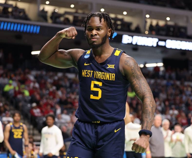 Mar 16, 2023; Birmingham, AL, USA; West Virginia Mountaineers guard Joe Toussaint (5) reacts after a basket while being fouled against the Maryland Terrapins during the second half in the first round of the 2023 NCAA Tournament at Legacy Arena. Mandatory Credit: Vasha Hunt-USA TODAY Sports