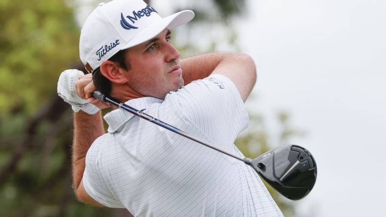 Mar 18, 2023; Palm Harbor, Florida, USA;  J.T. Poston plays his shot from the first tee during the third round of the Valspar Championship golf tournament. Mandatory Credit: Reinhold Matay-USA TODAY Sports