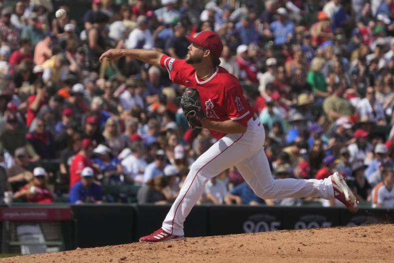 Mar 18, 2023; Tempe, Arizona, USA; Los Angeles Angels relief pitcher Ryan Tepera (52) throws against the Texas Rangers in the fifth inning at Tempe Diablo Stadium. Mandatory Credit: Rick Scuteri-USA TODAY Sports