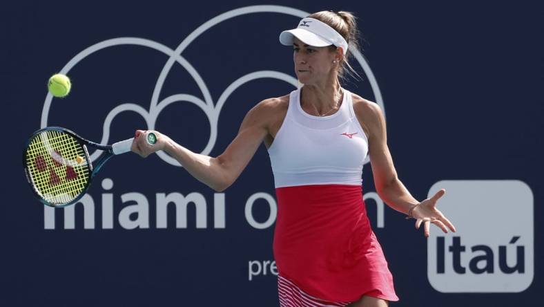 Mar 22, 2023; Miami, Florida, US; Anna Bondar (HUN) hits a forehand against Taylor Townsend (USA) (not pictured) on day three of the Miami Open at Hard Rock Stadium. Mandatory Credit: Geoff Burke-USA TODAY Sports