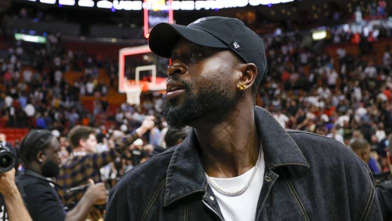 Mar 22, 2023; Miami, Florida, USA; Former Miami Heat player Dwyane Wade looks on after the game between the Miami Heat and New York Knicks at Miami-Dade Arena. Mandatory Credit: Sam Navarro-USA TODAY Sports