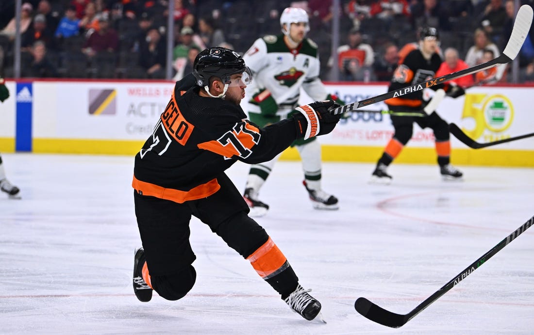 Mar 23, 2023; Philadelphia, Pennsylvania, USA; Philadelphia Flyers defenseman Tony DeAngelo (77) shoots against the Minnesota Wild in the third period at Wells Fargo Center. Mandatory Credit: Kyle Ross-USA TODAY Sports