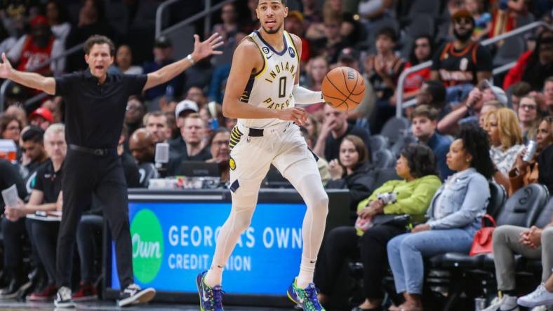 Mar 25, 2023; Atlanta, Georgia, USA; Indiana Pacers guard Tyrese Haliburton (0) dribbles against the Atlanta Hawks in the second quarter at State Farm Arena. Mandatory Credit: Brett Davis-USA TODAY Sports