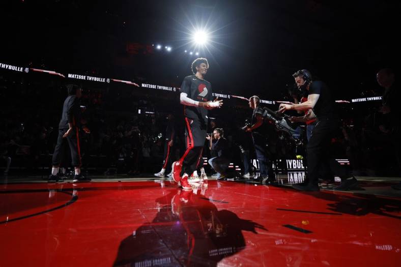 Mar 27, 2023; Portland, Oregon, USA; Portland Trail Blazers forward Matisse Thybulle (4) is introduced as part of the starting lineup before the game against the New Orleans Pelicans at Moda Center. Mandatory Credit: Soobum Im-USA TODAY Sports