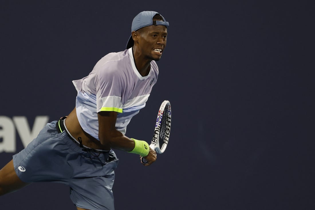 Mar 28, 2023; Miami, Florida, US; Christopher Eubanks (USA) serves against Adrian Mannarino (FRA) (not pictured) on day nine of the Miami Open at Hard Rock Stadium. Mandatory Credit: Geoff Burke-USA TODAY Sports