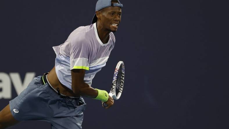 Mar 28, 2023; Miami, Florida, US; Christopher Eubanks (USA) serves against Adrian Mannarino (FRA) (not pictured) on day nine of the Miami Open at Hard Rock Stadium. Mandatory Credit: Geoff Burke-USA TODAY Sports