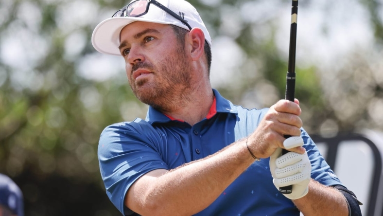 Mar 31, 2023; Orlando, Florida, USA; Louis Oosthuizen of the Stinger golf club plays his shot from the seventh tee during the first round of a LIV Golf event at Orange County National. Mandatory Credit: Reinhold Matay-USA TODAY Sports